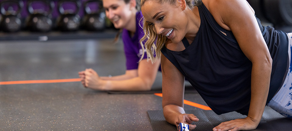 Three-time U.S. Olympian Lolo Jones (right) and Abbott STEM intern Allison  exercise to keep their hearts healthy in the "❤ Your Heart" virtual field trip.