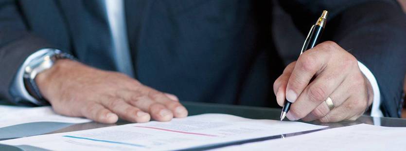 A hand charting a graph